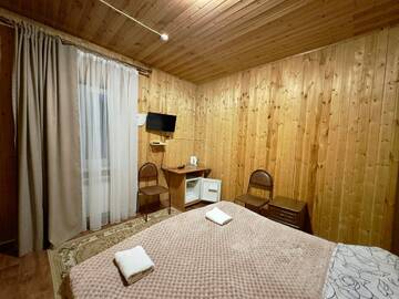 Четырехместный номер с балконом в Гостинице Лесная Сказка