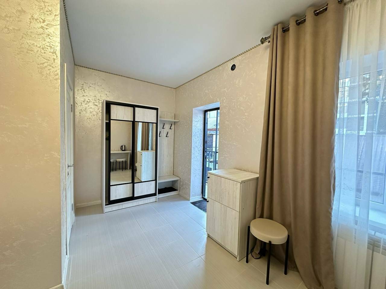 Фотографии номера Двухместный номер-студия Делюкс с 1 кроватью в Гостинице Лесная Сказка Домбай