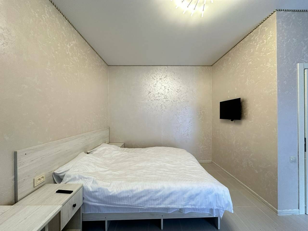 Фотографии номера Двухместный номер-студия Делюкс с 1 кроватью в Гостинице Лесная Сказка Домбай